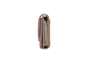 Detailed side view of brown leather multi-layer zip wallet with fine stitching