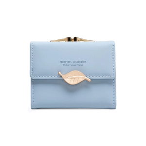 Detail view of sky blue women's short wallet with gold leaf buckle and neat stitching