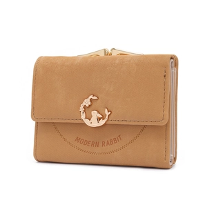 Detail view of the vintage brown matte tri-fold wallet with golden rabbit metal clasp