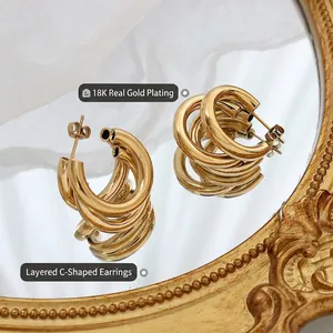 Three-layer C-shaped gold plated titanium earrings with minimalist layered design