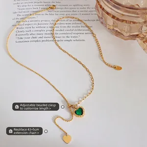 Adjustable K18 gold heart necklace with green zircon pendant and tassel detail