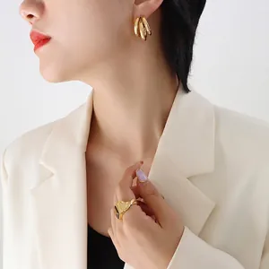 Three-layer C-shape gold titanium steel hollow hoop earrings and textured wide ring set