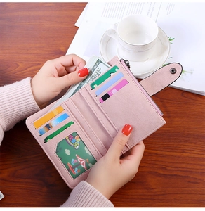 Internal view showing multiple card slots and cash compartment of light pink short wallet