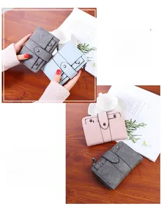 Short faux leather wallets in assorted colors with snap buttons and rivet accents
