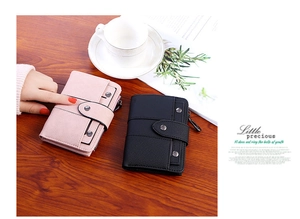 Minimalist women's matte wallets in pink and black with metal zip and snap closure