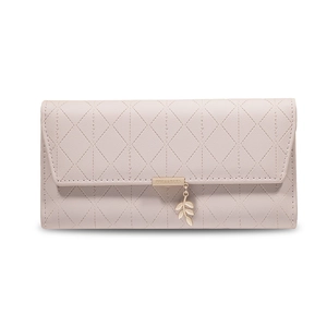 Close-up of pink long wallet with diamond quilting, gold leaf charm and metal logo