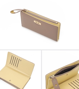 Detailed view of women's long wallet showing multi-card slots and heart metal buckle