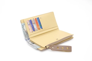Detail view of multi-card slots and heart-strap detail on a women long zip wallet