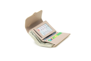 Macro view of beige bifold wallet showing multi-card slots and large bill compartment