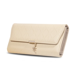 Close-up of cream PU leather wallet featuring leaf pendant and quilted stitching