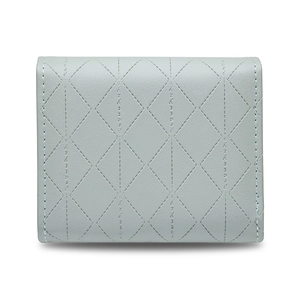 Detailed view of grey quilted leather wallet with stitched logo pattern and zip closure