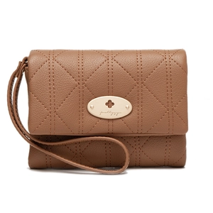 Detail of brown quilted faux leather wallet with gold metal logo and wristlet strap