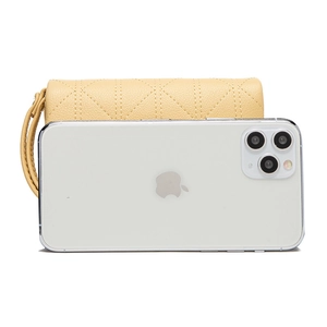 Size comparison of light yellow quilted PU leather wallet with a smartphone