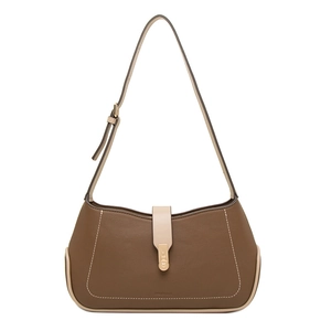 Detail of brown litchi leather underarm bag with beige stitching and heart gold lock
