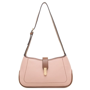 Pink pebbled leather shoulder bag detail with brown trim and golden heart buckle