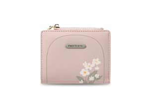 Dettaglio del portafoglio in pelle PU rosa chiaro con motivo floreale e zip dorata
