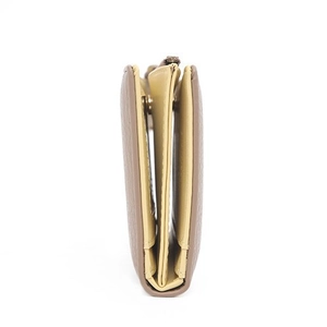 Taupe pebbled leather folding wallet featuring dual-color layers and secure metal zipper