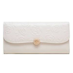 Close-up of elegant rose embossed pattern and golden metal buckle on long PU leather wallet