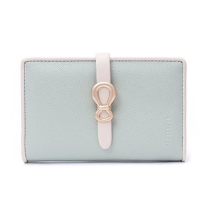 Close-up of light green Saffiano leather wallet with gold bow buckle and contrast piping