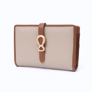 Detail of cross-grain leather wallet with a champagne gold knot-shaped metal buckle