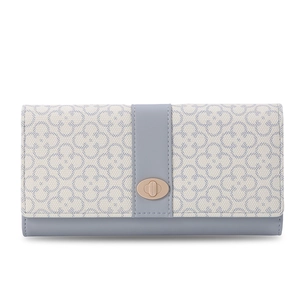 Close-up of cream and blue long wallet with clover pattern and gold rotating metal lock