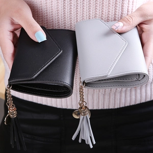 Short tri-fold tassel wallet for women with matte faux leather and heart charm