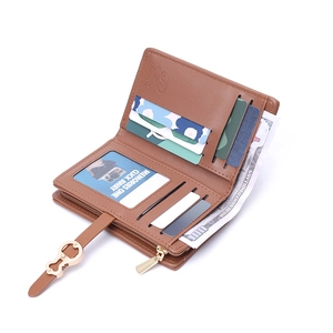Brown bi-fold faux leather wallet for women with multi-card slots and zippered coin pocket