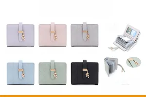 Close-up of RFID women wallet with leaf pendant and multi-card slot interior design