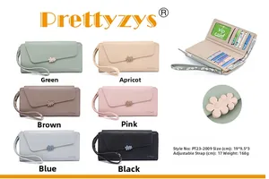 Detail view of large capacity long PU leather wallet with floral magnetic clasp and strap