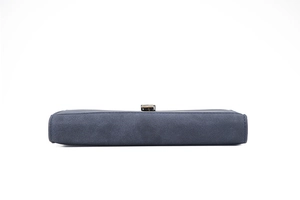 Detail view of navy blue wallet base featuring textured Saffiano leather and clean stitching