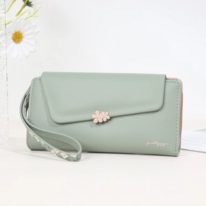 Pale green long leather wallet for women with floral clasp and wrist strap detail