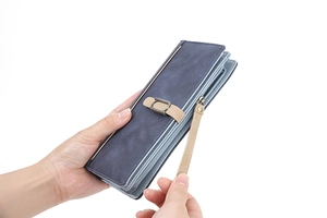 Detail view of the multi-layer interior and blue matte texture of this long clutch wallet