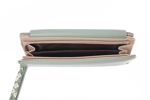 Detail view of double-compartment long wallet interior with floral wristlet strap