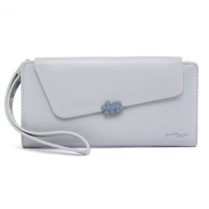 Detailed view of light blue faux leather long wallet with flower clasp and wrist strap