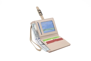 Detail view of the beige matte leather wallet featuring multiple card slots and ID window