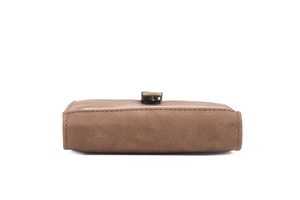 Detailed view of dark brown faux leather wallet bottom showing stitching and metal hardware