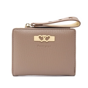 Detail of khaki leather wallet with lychee texture and heart-shaped gold hardware