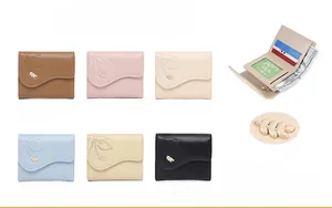 Detailed view of trifold PU leather wallet featuring leaf embroidery and internal card slots