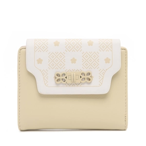 Detail of floral printed PU leather wallet with elegant petal-shaped gold metal clasp