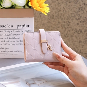 Pale purple quilted PU leather RFID wallet with metal leaf pendant and buckle closure