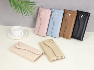 Detailed display of long leaf embroidery wallets in various colors on a clean surface