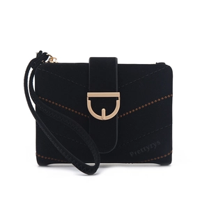 Close-up of black matte women's wallet with golden D-ring buckle and wrist strap