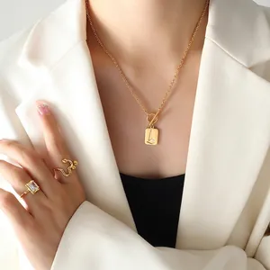 Minimalist 18K gold plated stainless steel necklace with geometric pendant and zircon rings