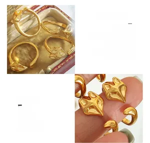 Macro shot of an adjustable fox-shaped copper ring in a premium golden plating finish