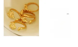 Detailed view of adjustable golden fox head ring with a polished metallic finish