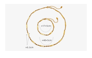 Detail of gold blade chain set showing adjustable lobster clasp and 0.3cm width dimensions