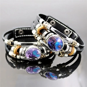 Black multilayer leather dragon bracelet with blue glass cabochon and metal beads