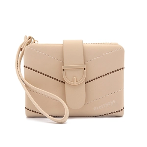 Close-up of beige short wallet with V-stitch pattern and brand logo metal buckle