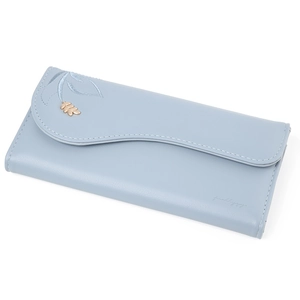 Detail of light blue wallet featuring wave-cut flap with golden leaf metal ornament