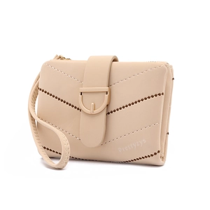 Beige quilted leather clutch with contrast stitching and wristlet strap on white background